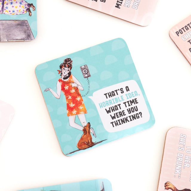 Drinks coasters with a vintage-style illustration of a woman and text on a light blue background