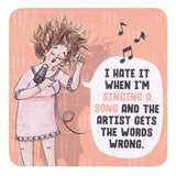 Drinks coasters with a person singing into a microphone with a humorous quote on a pink background.