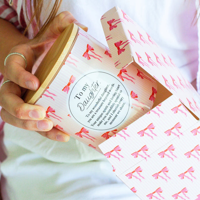 Scented candle gift for daughter with pink bow design and wooden lid