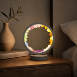 Gleneagles chakra crystal LED lamp illuminated within a contemporary grey frame