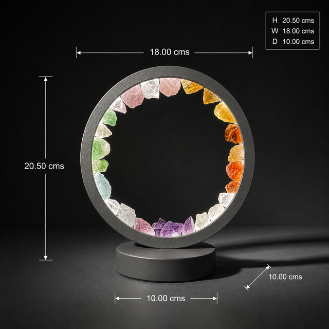 Colourful chakra-inspired crystals illuminated inside Gleneagles Circle Earth Lamp