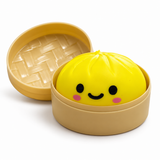 Glow Up Dumpling squishy toy in included basket