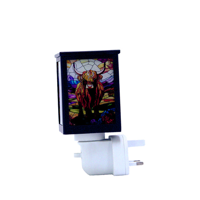 Golden highland cow plug in wax melt burner front view with detailed finish