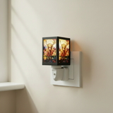 Golden highland cow wax burner creating a cosy glow in a living room setting