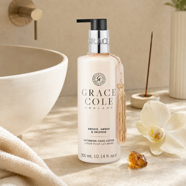 Grace Cole luxury hand lotion styled beside a bathroom basin