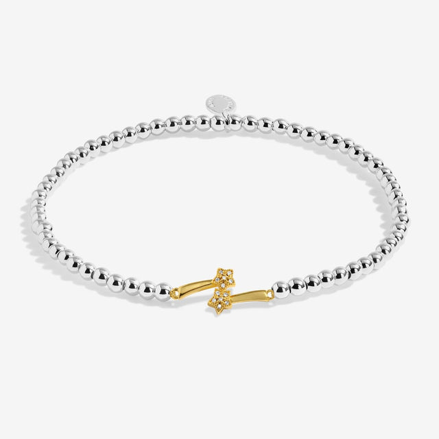 Joma A Little girls' birthday bracelet presented on illustrated Shine Bright sentiment card