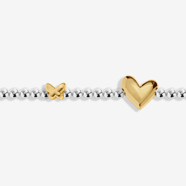 Close-up of heart charm on Joma Jewellery April birth month bracelet