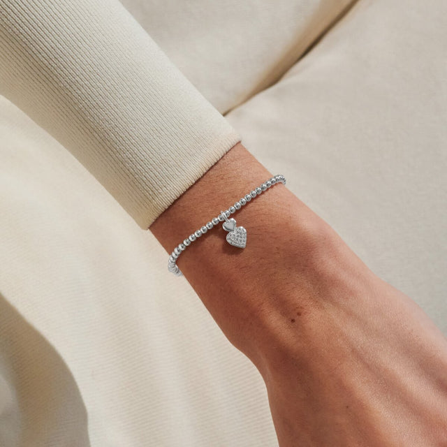 Joma Jewellery A Little Best Big Sis silver bracelet worn on wrist