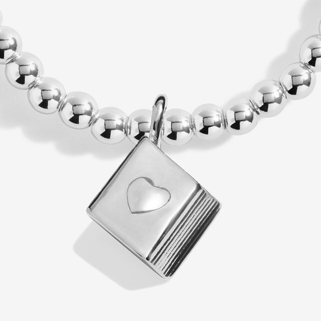 Joma Jewellery silver Book Lover bracelet with beaded stretch design and book charm