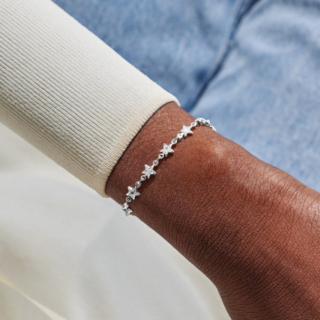 Joma Jewellery silver star tennis bracelet worn on wrist for everyday styling