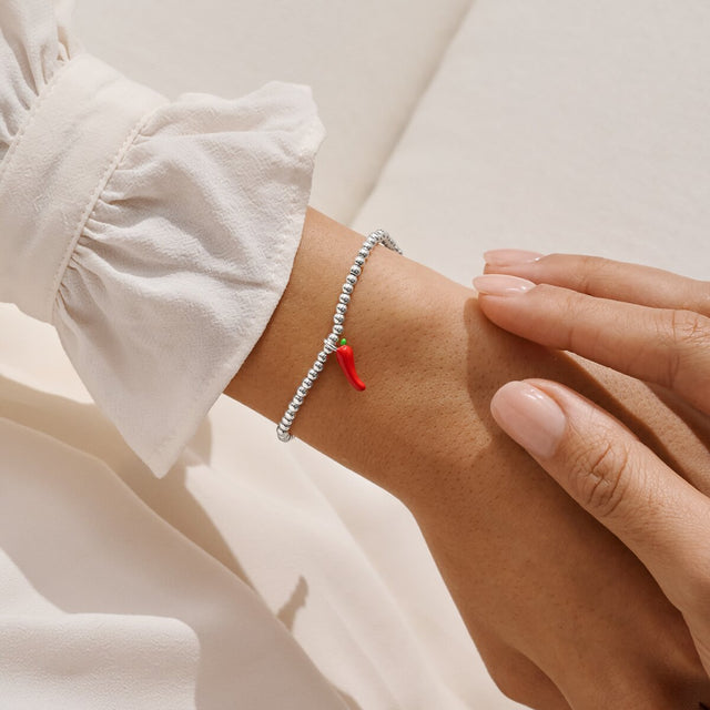 Joma Jewellery Spice Of Life chilli pepper bracelet presented as a fun jewellery gift for her