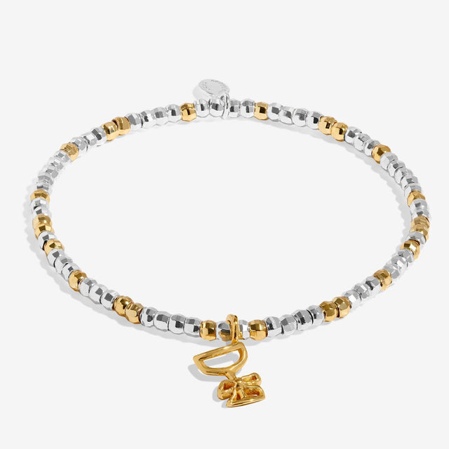 Joma Jewellery Fizz The Season silver and gold-plated bracelet shown in full with its charm