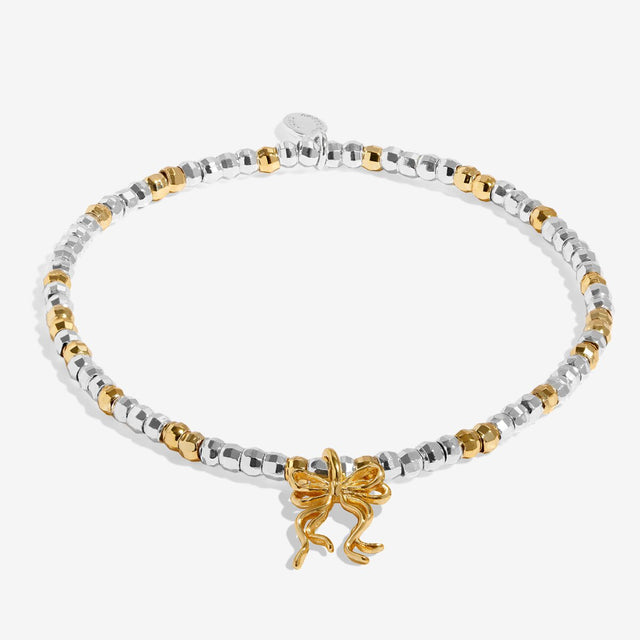 Joma Jewellery Happy Friendmas silver and gold-plated bracelet shown in full with its charm