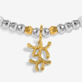 Joma Jewellery Love And Wishes silver and gold-plated bracelet close-up of the gold-plated mistletoe charm