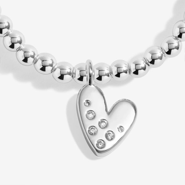 Close-up of heart charm on Joma Jewellery Confetti A Little 18th Birthday silver-plated bracelet