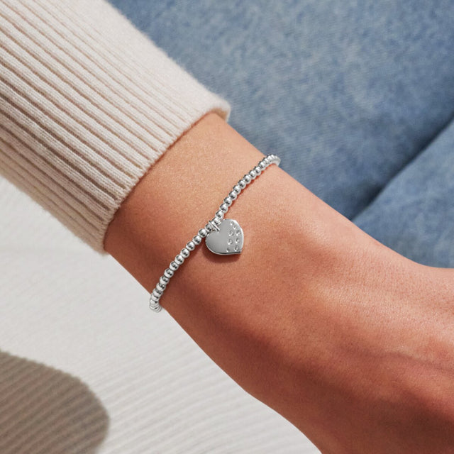 Joma Jewellery Confetti A Little 21st Birthday silver-plated bracelet worn on the wrist