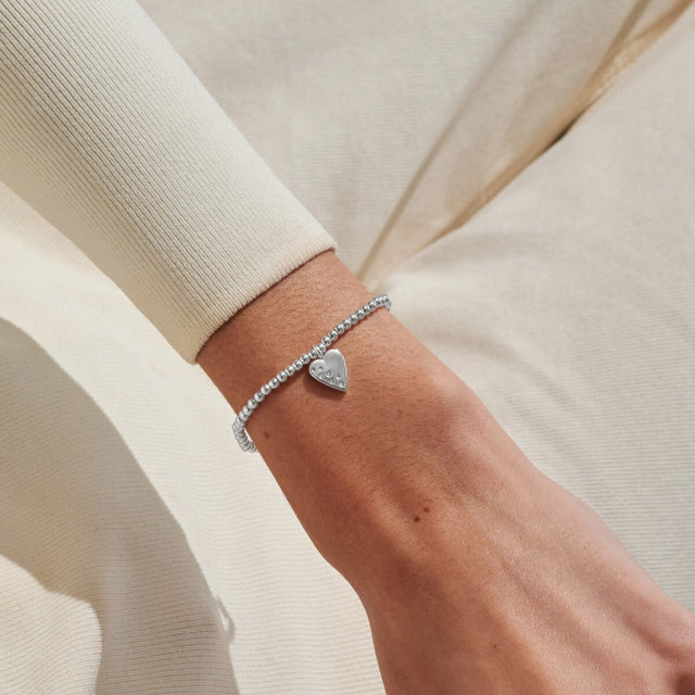 Joma Jewellery Confetti A Little 40th Birthday silver-plated bracelet worn on the wrist