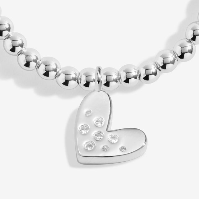 Close-up of heart charm on Joma Jewellery Confetti A Little 60th Birthday silver-plated bracelet