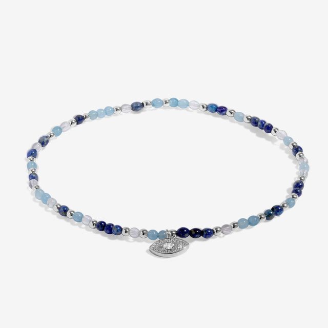 Silver beaded evil eye jewellery anklet with blue accents