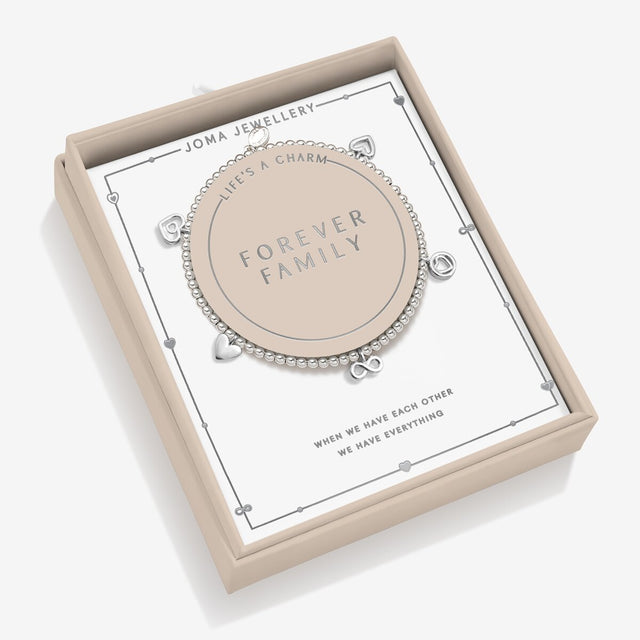 Joma Jewellery Forever Family bracelet presented in a buttercream and blush pink gift box
