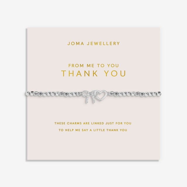 Joma Jewellery From Me To You Thank You bracelet presented on a blush pink sentiment card