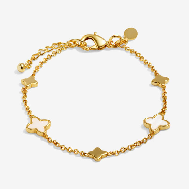Gold clover bracelet with mother of pearl clover motifs on fine chain