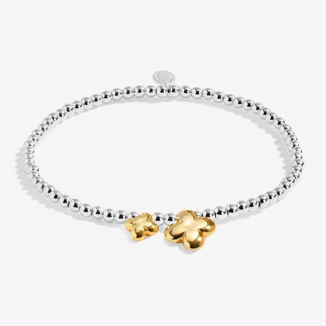 Silver beaded gold clover bracelet with lucky charm detail