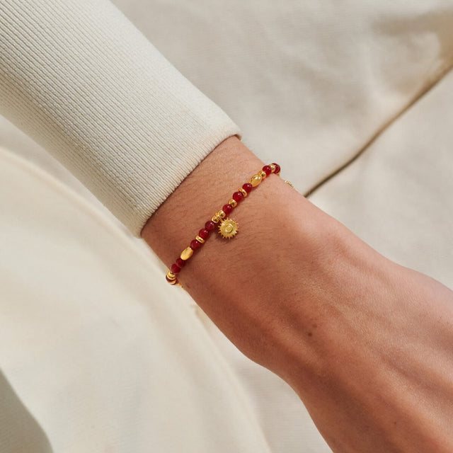 Joma Jewellery Happiness gold affirmation bracelet worn on wrist