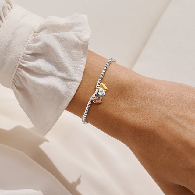 Joma Jewellery Happy 16th Birthday bracelet presented on a gold foil sentiment card
