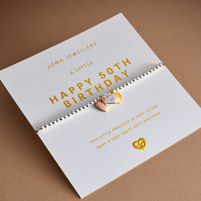 Joma Jewellery Happy 50th Birthday bracelet presented on a 3D gold foil sentiment card