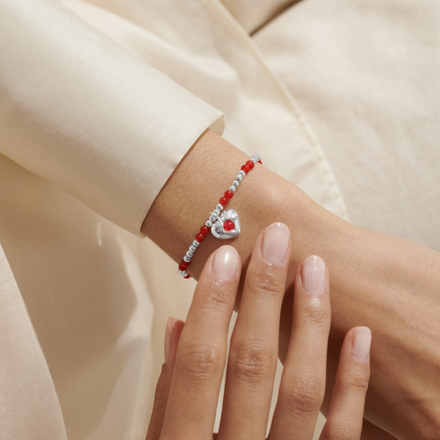 Joma Jewellery January garnet birthstone bracelet worn on wrist