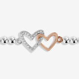 Joma Jewellery daughter bracelet with interlinked silver and rose gold double heart charm