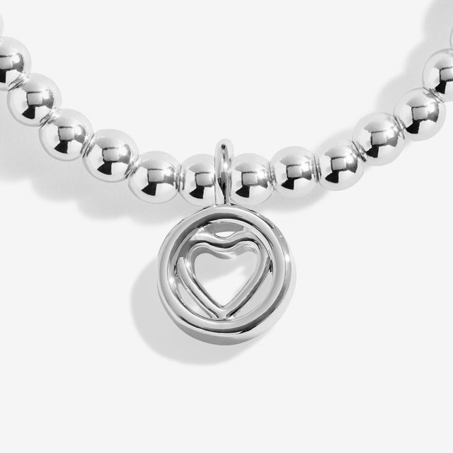 Silver heart and infinity charms on Joma Jewellery Forever Family bracelet