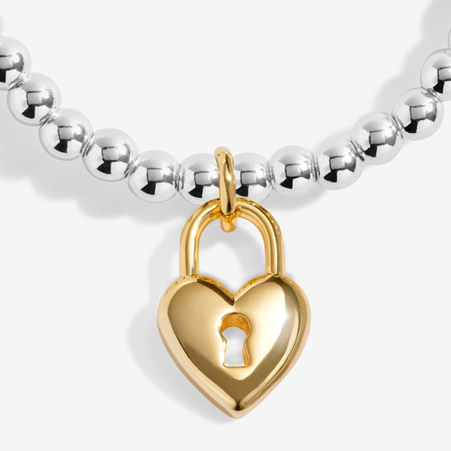 Joma Jewellery silver beaded bracelet with gold-plated heart locket charm