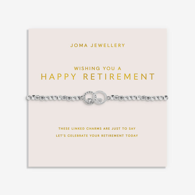 Joma Jewellery Wishing You A Happy Retirement bracelet displayed on a blush pink sentiment card