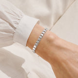 Joma Jewellery silver heart chain bracelet worn on the wrist