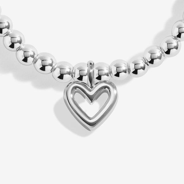 Silver heart and infinity charms on Joma Jewellery Forever Family bracelet