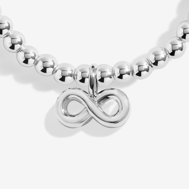 Silver heart and infinity charms on Joma Jewellery Forever Family bracelet