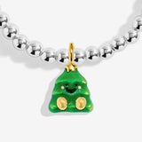 Close-up of the green Christmas tree character charm with gold-coloured details on Joma Jewellery's Jomees It's Christmaasss! kids' bracelet