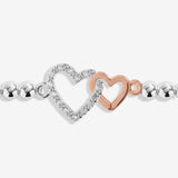 Joma Jewellery niece bracelet with interlinked silver and rose gold heart charms