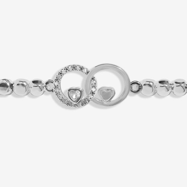 Joma Jewellery silver retirement bracelet with hammered beads and interlinked circle charms