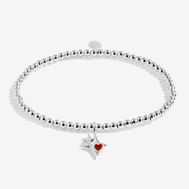 Joma Jewellery silver-plated bracelet with starburst charm and red heart detail