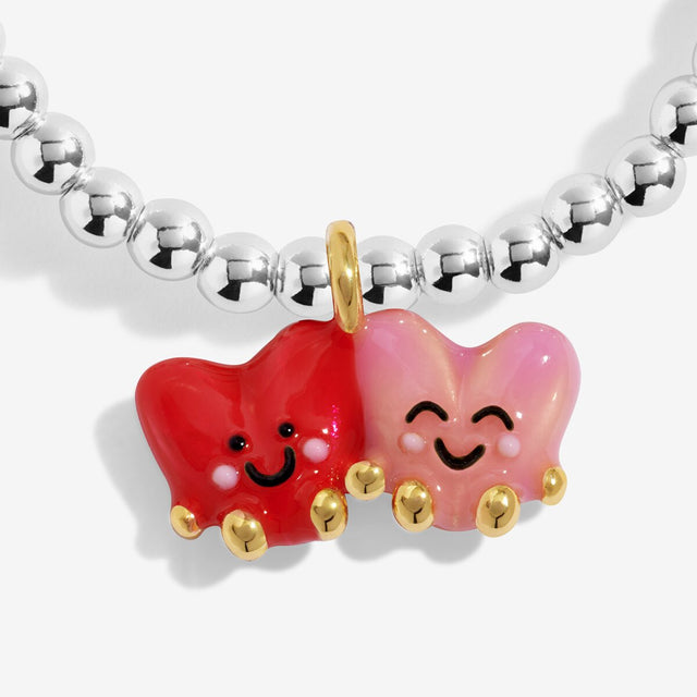 Colourful Lovie and Dovie enamel heart charms on Joma Jewellery Jomees bracelet
