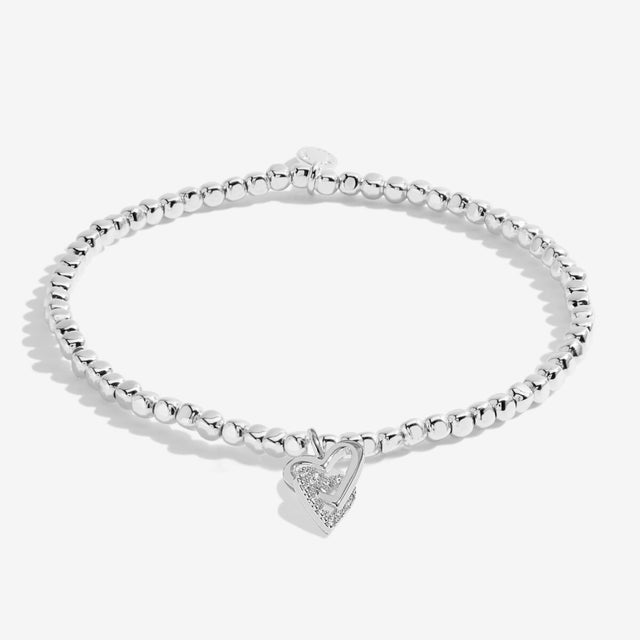 Silver plated beaded bracelet with interlinked heart charms for grandma