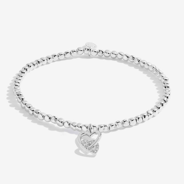 Silver plated beaded bracelet with interlinked heart charms for sister