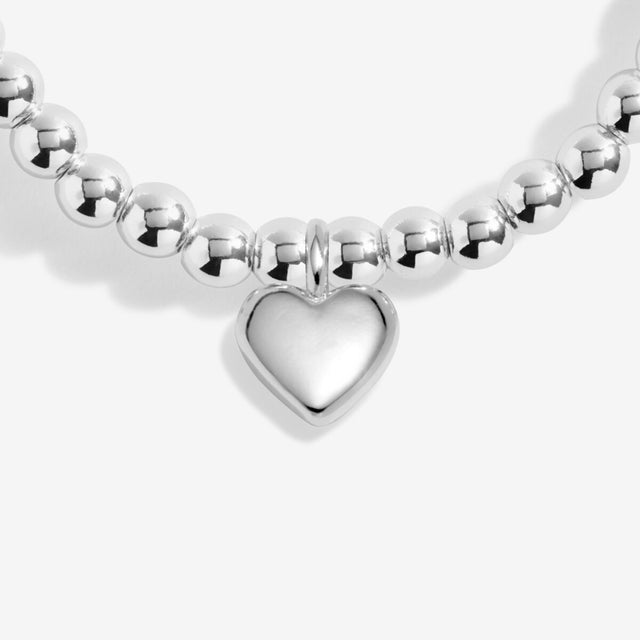 Close-up of silver heart charm on Joma Jewellery Lovely Friend bracelet