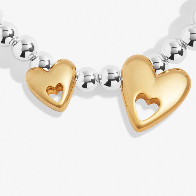 Gold heart charm detail on bracelet for mums