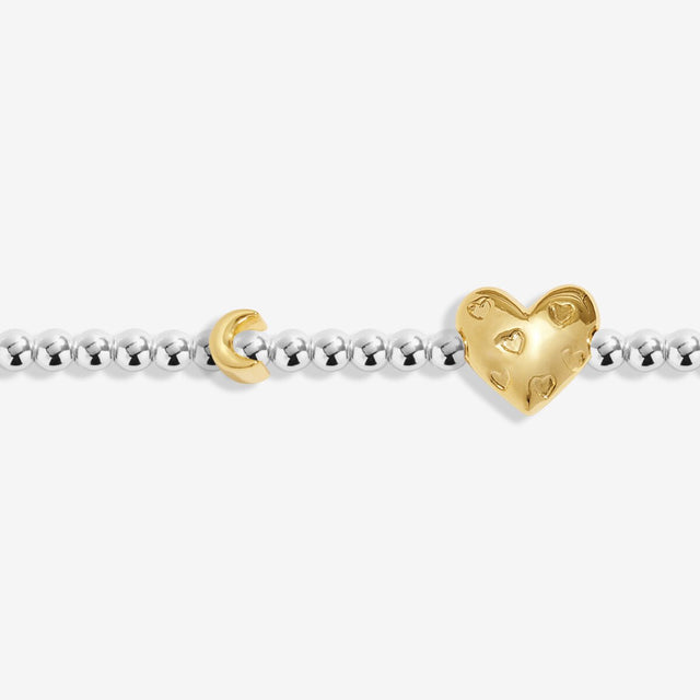 Close-up of heart charm on Joma Jewellery November birth month bracelet