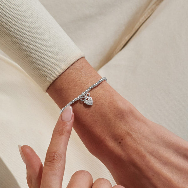 Joma Jewellery A Little Prom silver bracelet worn on wrist