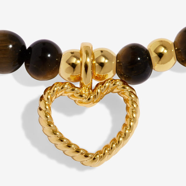 Joma Jewellery Strength bracelet charm close up gold plated detail